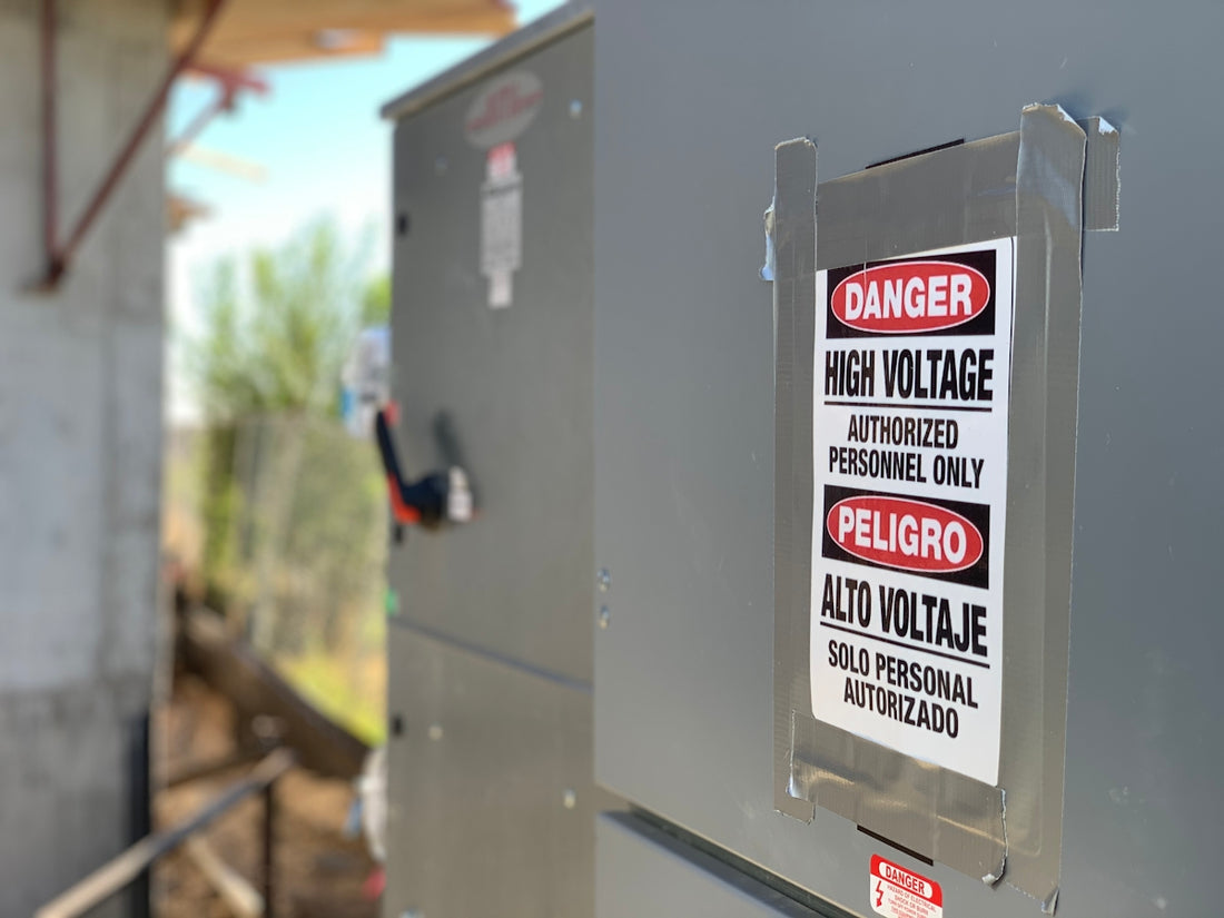 a close up of a metal box with a sign on it